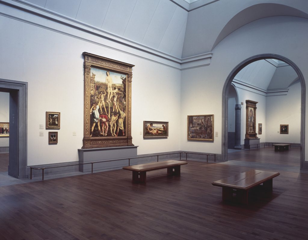 Room 59 in the National Gallery's Sainsbury Wing, 1991, showing Italian renaissance paintings by Gherardo di Giovanni del Flora, the Pollaiuolo brothers, Piero di Cosimo, and Pinturicchio.