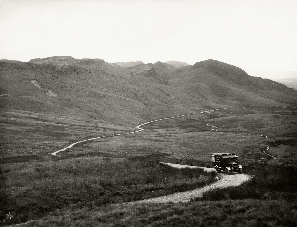 An LMS van on a single track road amongst hills, transporting National Gallery paintings to Manod Quarry during World War II.